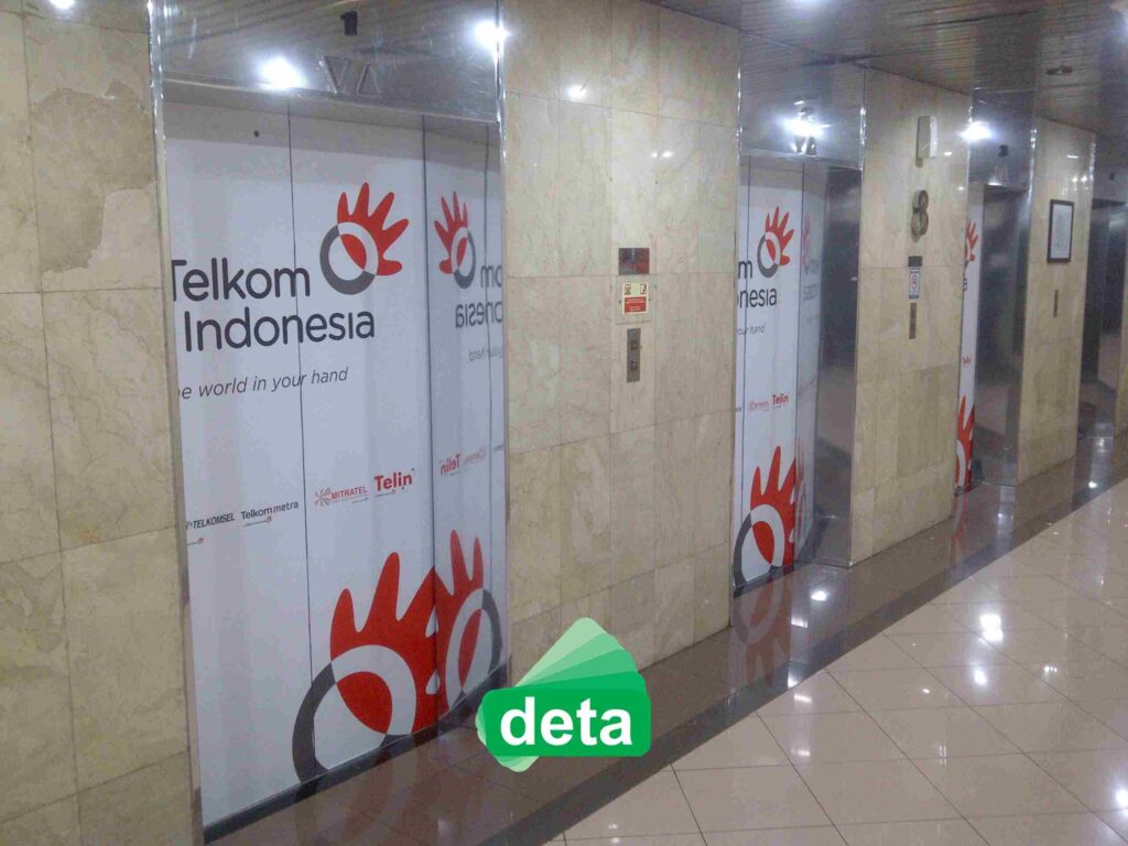 jasa pembuatan sticker lift by deta untuk kantor telkomsel